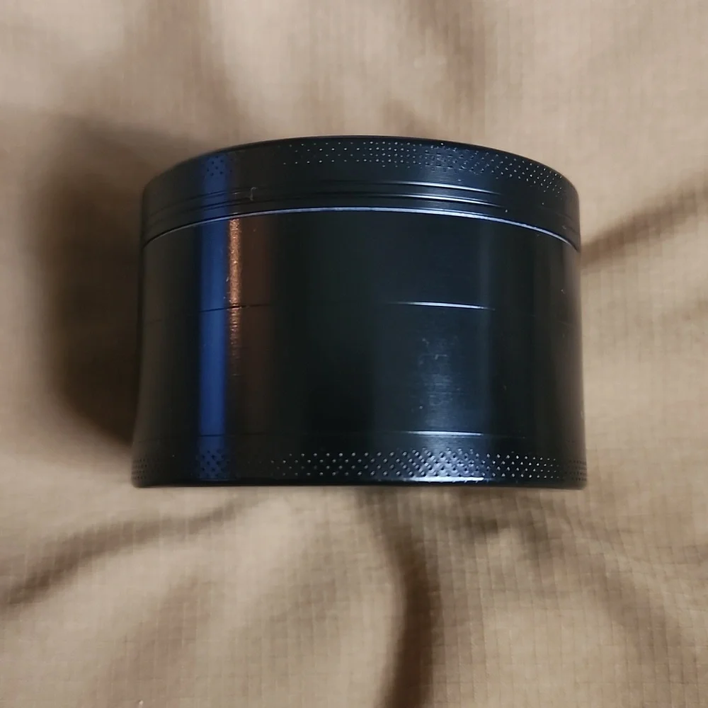 Black Herb and Spice Grinder with Leprechaun Design